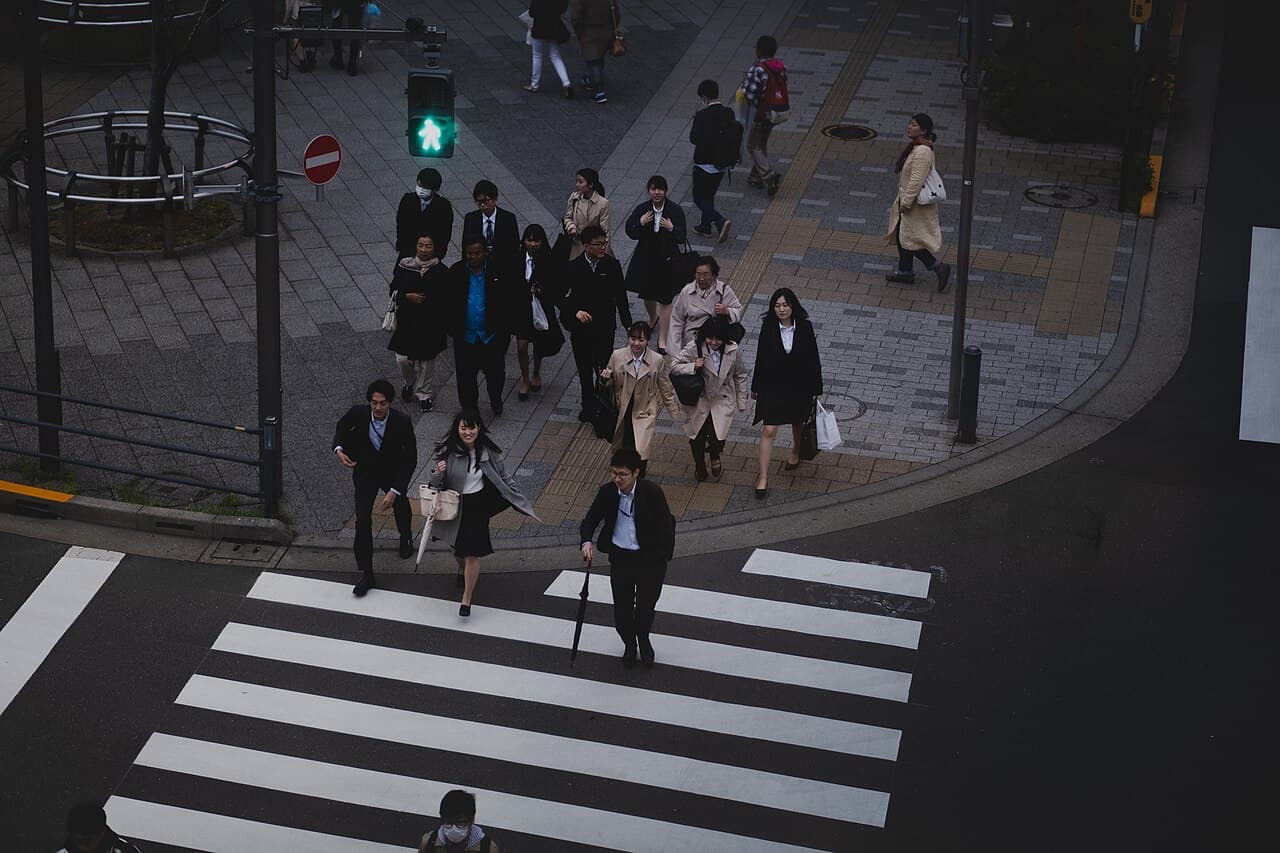 Pedestrians crossing a street in Tokyo, Japan.